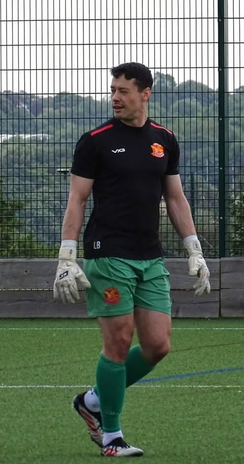 Lewis in his goalkeeper kit on the pitch